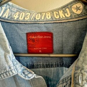 Blue Calvin Klein denim button down shirt- men XL